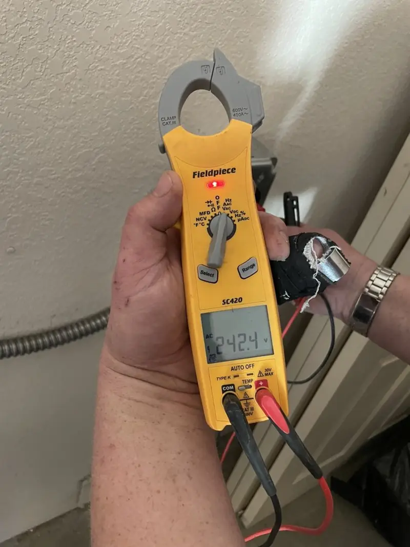 Voltage testing with clamp meter during Whole House Surge Protector in Sharpsville